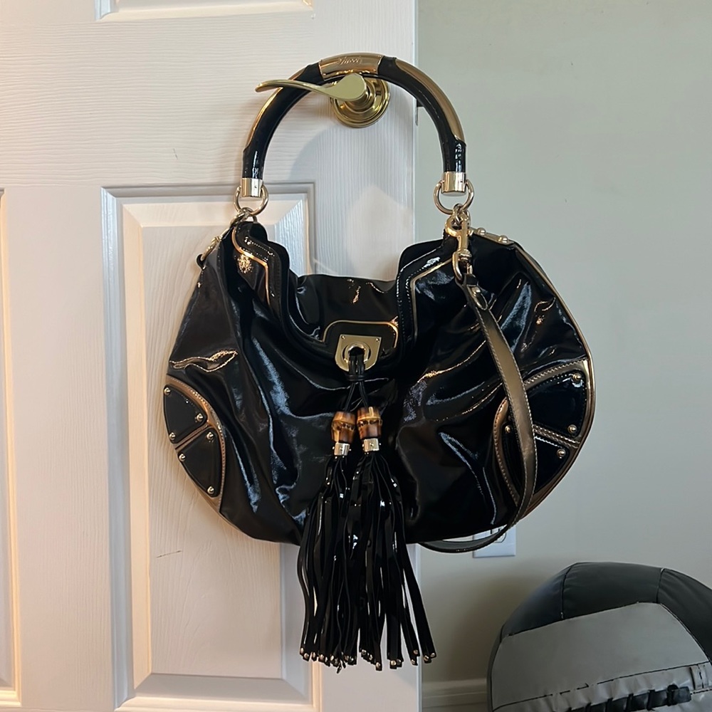 Gucci Indy leather hardback never worn